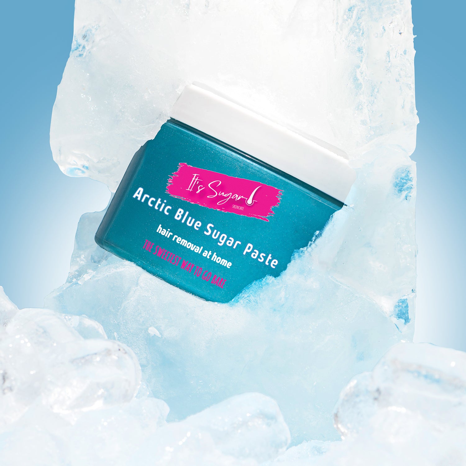 Arctic Blue Sugar Paste frozen in a bloack of ice, chiseled away to reveal the front. Surrounded by more ice cubes
